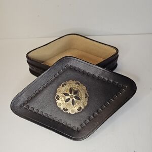 Vintage tooled leather trinket lidded box diamond shape Brass medallion